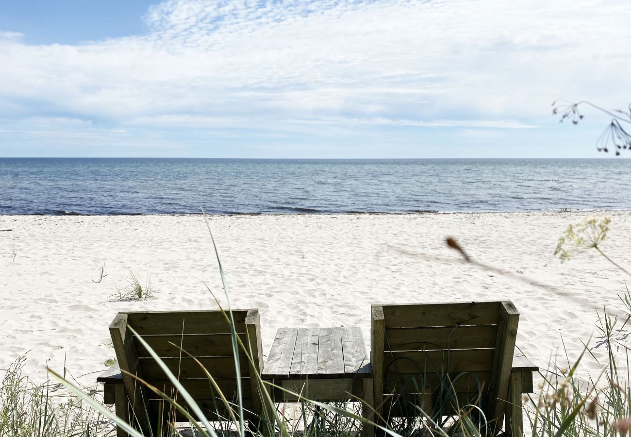 Ferienhaus in Beddingestrand - Ferienhaus am Strand mit Meerblick, Sauna und Privatsphäre in Beddingestrand | SE01061